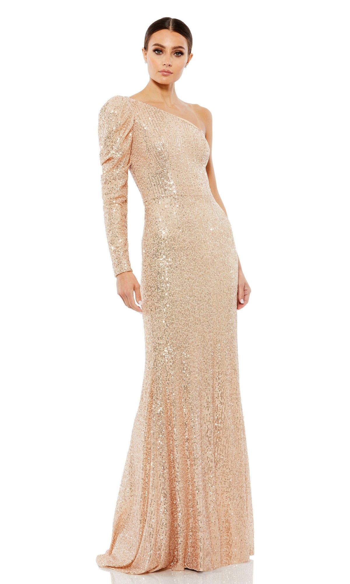 A woman models the Mac Duggal 26591 One-Sleeve Sequin Formal Dress in light gold, a floor-length evening gown, posed against a white background.